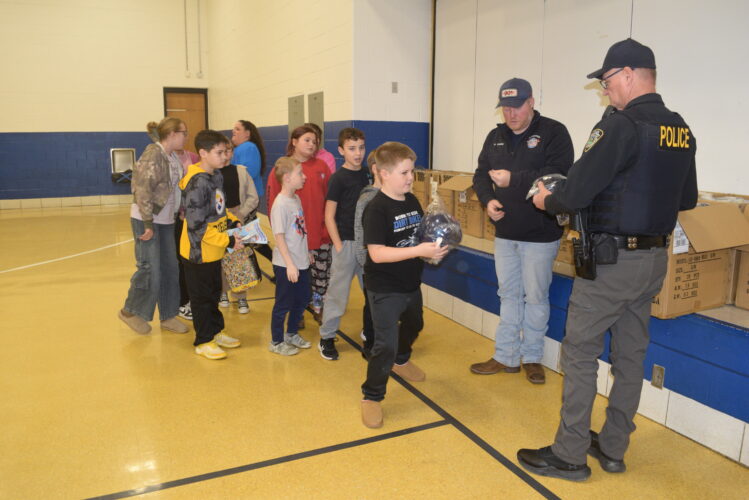 300 Students Gifted Bike Helmets at Cameron Elementary School